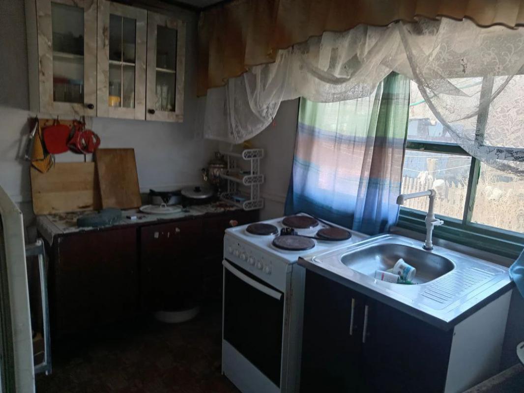 Продам дом (дом на двух хозяев), баня, сарай, большой участок в доме погреб, отопление электр.(380в) - Гай