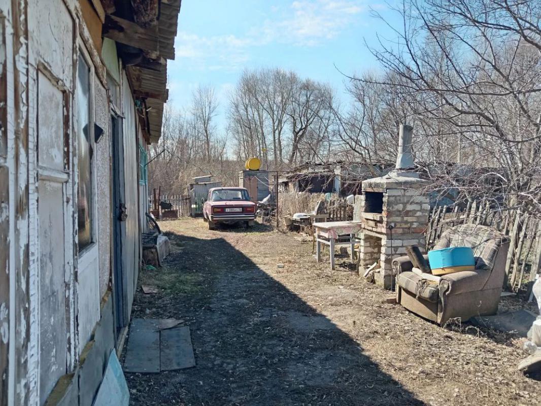 Продам дом (дом на двух хозяев), баня, сарай, большой участок в доме погреб, отопление электр.(380в) - Орск