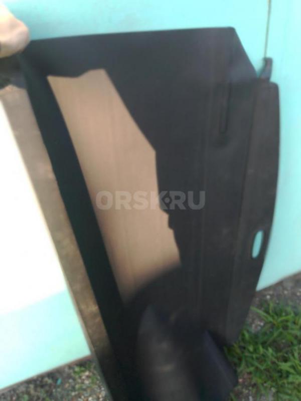 Продам шторку в багажник,точно не скажу от чего ,но похоже от шкоды кодиак, при нажатии на сторону с - Орск