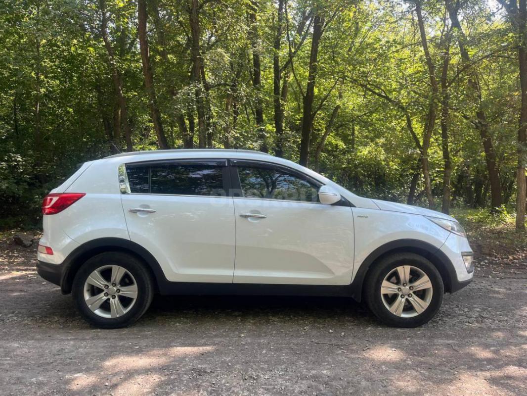 Продам Кия Спортейдж 3 2013 год полн привод механика  Автозапуск газ присан зима на дисках пробег ро - Орск