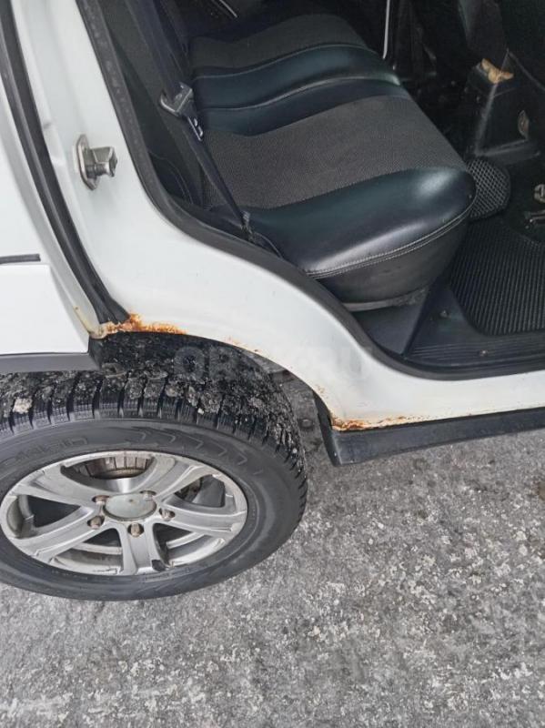 Шевроле нива в хорошем состояние есть рыжики но не гнилая нужен небольшой ремонт ходовки. - Орск