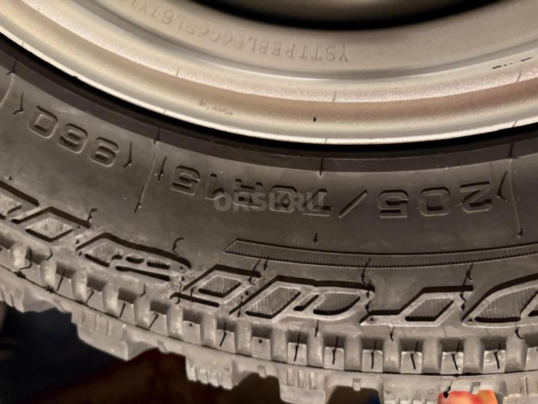 Продам шины 205/70 R 15  Cordiant  в сборе со штампованными дисками, стояли на автомобиле Шевроле Ни - Орск