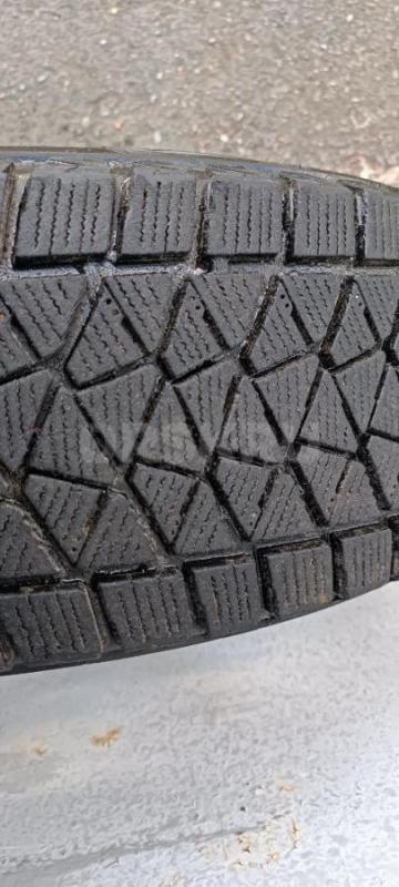 комплект зимних фрикционных шин Bridgestone Blizzak DM-V2 215x70 R17 в отличном состоянии. - Орск