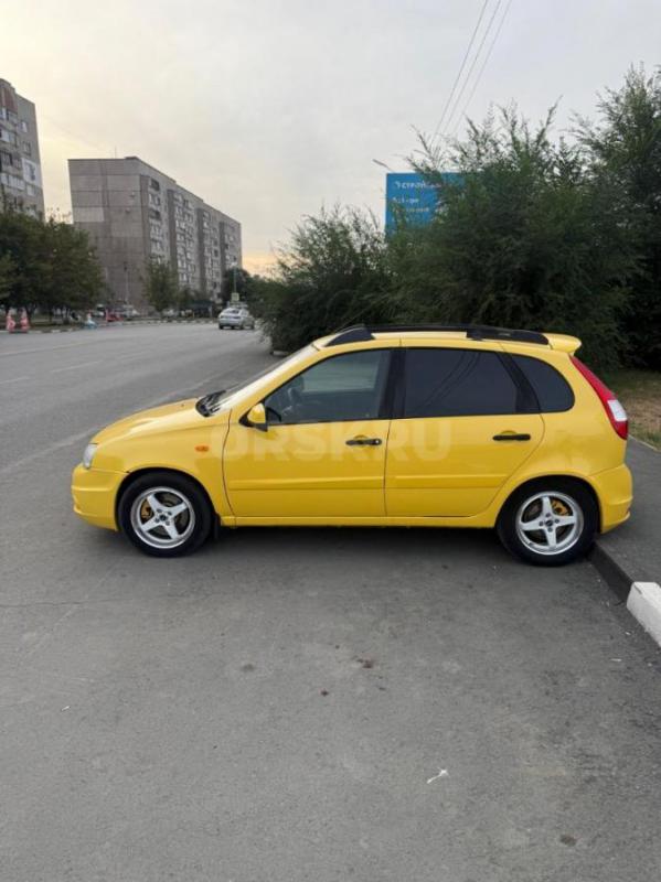 В продаже Лада калина спорт 1 в очень красивом ярком желтом цвете,установлен андроид планшет в дверн - Орск