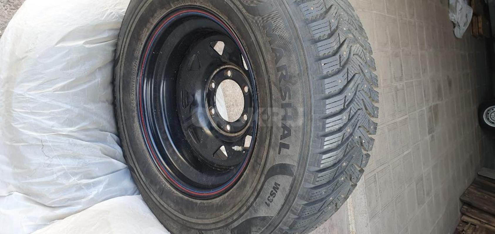 Комплект зима шины MARSHAL WS 31 245/70 R16 В отличном состоянии ( все шипы целые ), накат 1 месяц . - Орск